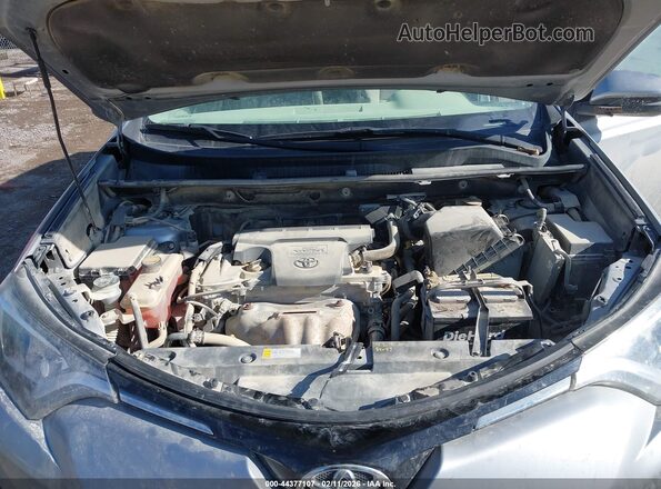 2T3RFREVXGW537088 2016 TOYOTA LE Silver Вид ззаду