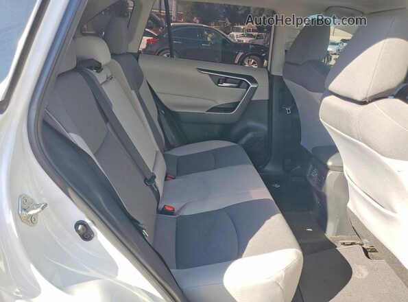 2T3W1RFV3KC023657 2019 TOYOTA LE White Вид задньої частини салону