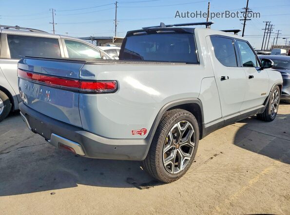 7FCTGAAA0PN022500 2023 RIVIAN RIT Серый Передняя правая четверть