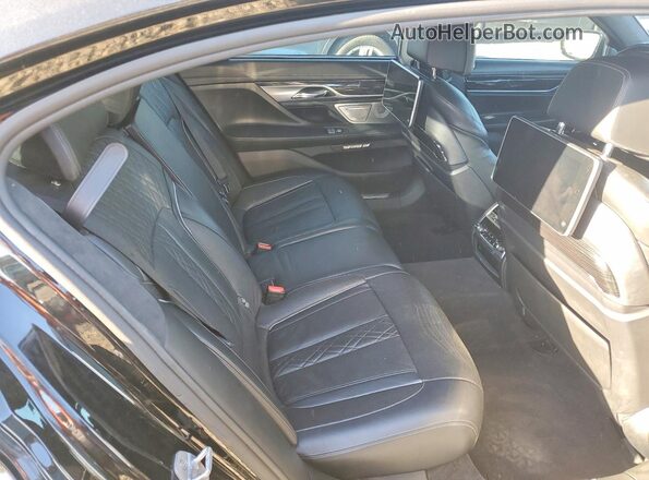 WBA7F0C55GGL99569 2016 BMW 7 SERIES Black Vista interior trasera