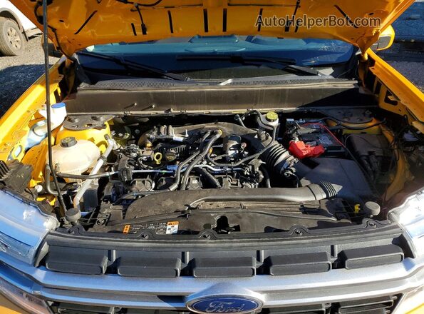 3FTTW8F93PRA64320 2023 FORD MAVERICK Yellow Rear interior view