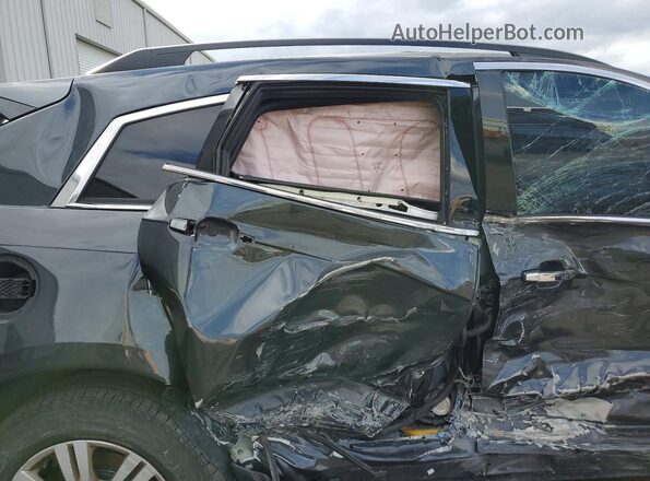 3GYFNAE37GS531570 2016 CADILLAC SRX Серый Вид задней части салона