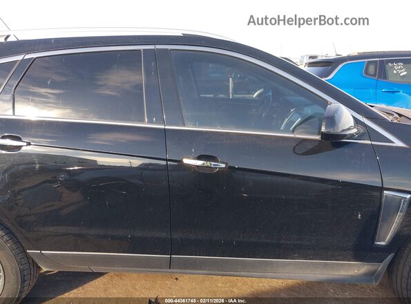 3GYFNCE34GS559337 2016 CADILLAC SRX Черный Вид задней части салона
