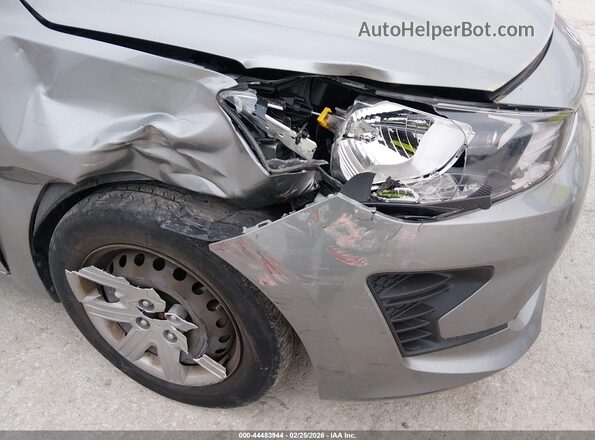 3KPA24AD8PE561572 2023 KIA RIO Серый Вид спереди