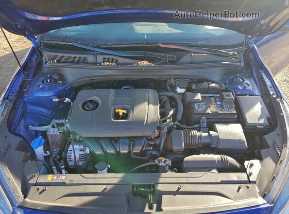 3KPF24AD9RE706238 2024 KIA FORTE Синий Вид задней части салона