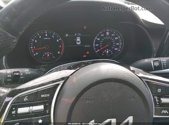 3KPF54AD3PE569396 2023 KIA FORTE Black Vista de los asientos traseros