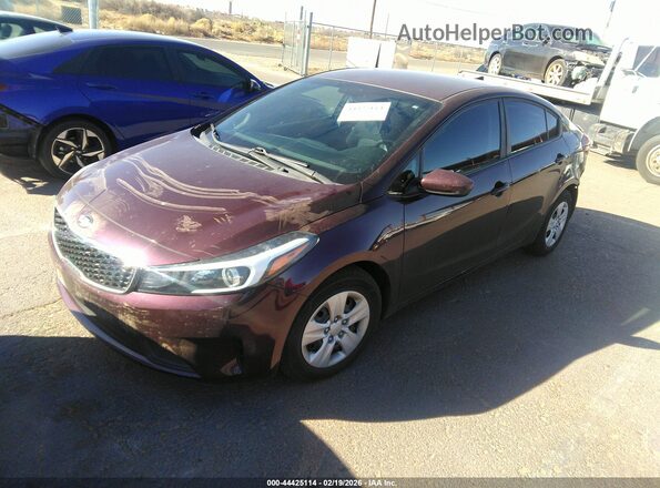 3KPFL4A71JE235987 2018 KIA FORTE Burgundy Առջևի ձախ երեք քառորդ տեսարան