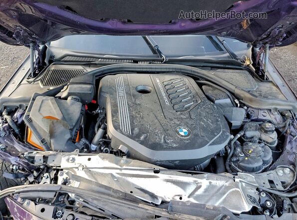 3MW53CM07R8E36935 2024 BMW M2 Purple Vista interior trasera