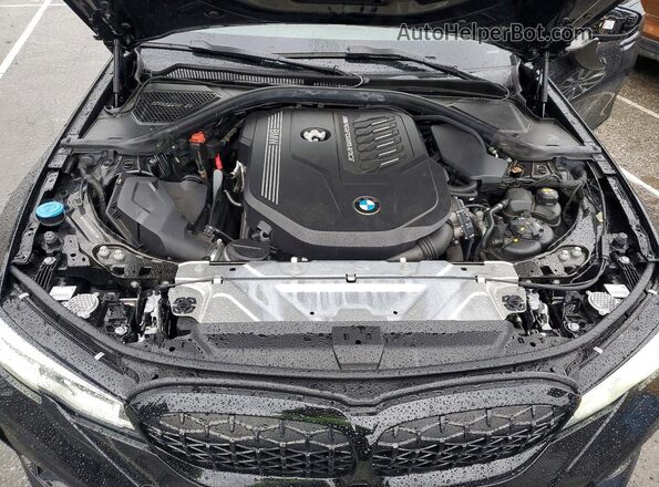 3MW5U7J00M8B85337 2021 BMW M3 Black Vista interior trasera