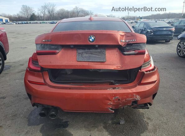 3MW5U9J01M8B62497 2021 BMW M3 Orange Widok z tyłu
