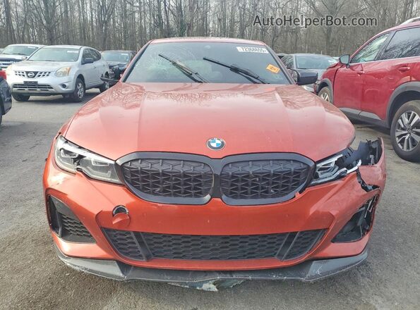 3MW5U9J01M8B62497 2021 BMW M3 Orange Widok z przodu