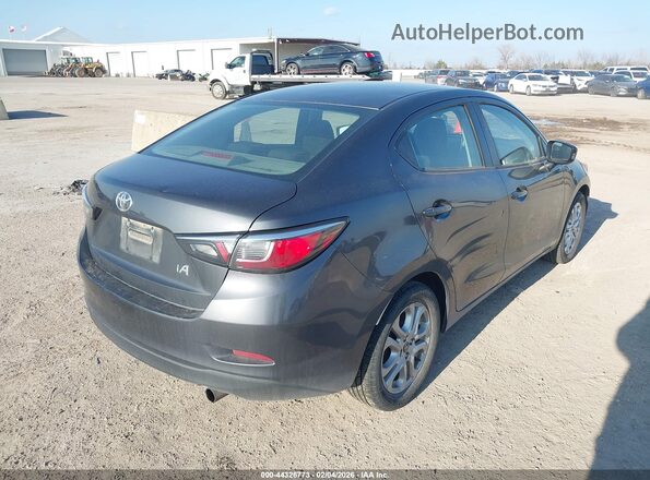 3MYDLBYV1JY314107 2018 TOYOTA YARIS IA Gray Trasero derecho