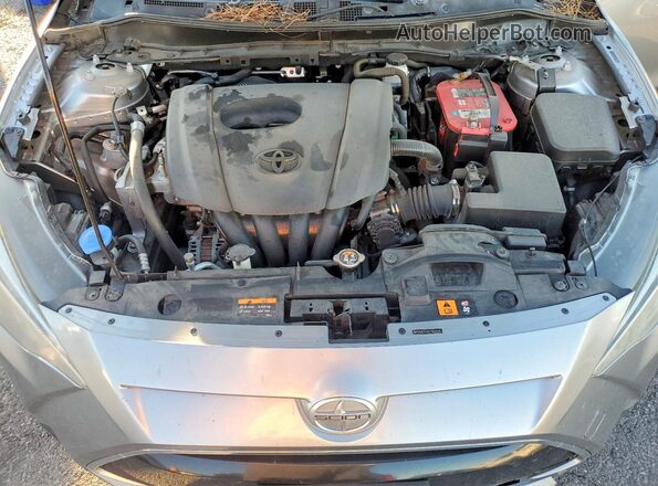 3MYDLBZVXGY102328 2016 TOYOTA SCION Silver Вид задньої частини салону