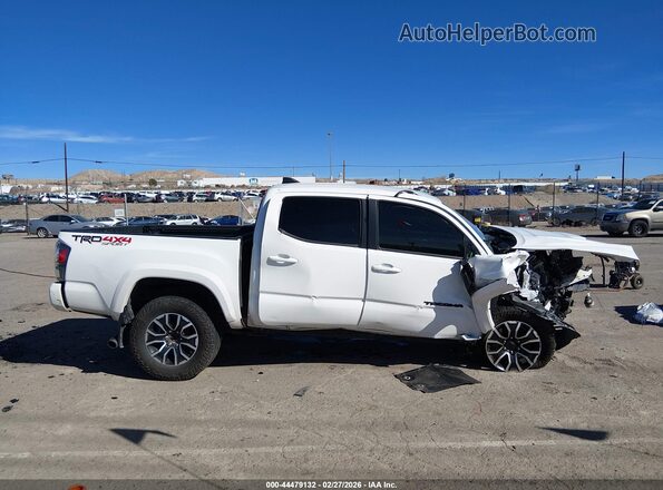3TMCZ5AN0LM325498 2020 TOYOTA TACOMA White Widok wnętrza z tyłu