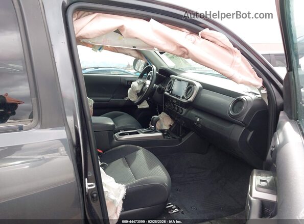 3TMCZ5AN0PM621434 2023 TOYOTA TACOMA Серый Вид салона спереди