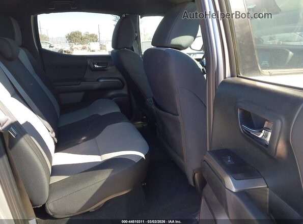 3TMCZ5AN0PM646785 2023 TOYOTA TACOMA Silver Widok naklejki z numerem VIN