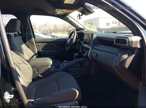 3TYLD5KN9ST020338 2025 TOYOTA TACOMA Black Front interior view