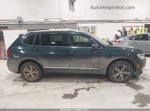 3VV2B7AX5KM112981 2019 VOLKSWAGEN TIGUAN Green Rear interior view