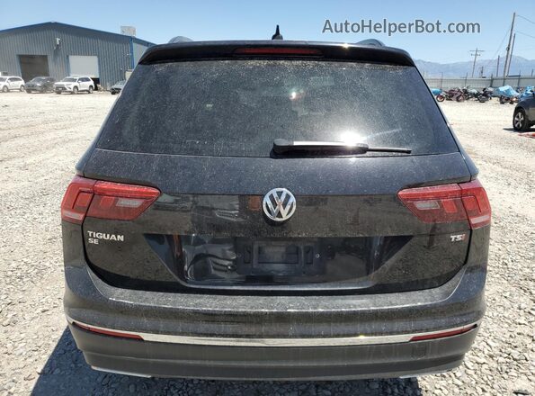3VV3B7AX2JM207792 2018 VOLKSWAGEN TIGUAN Black უკანა ხედი