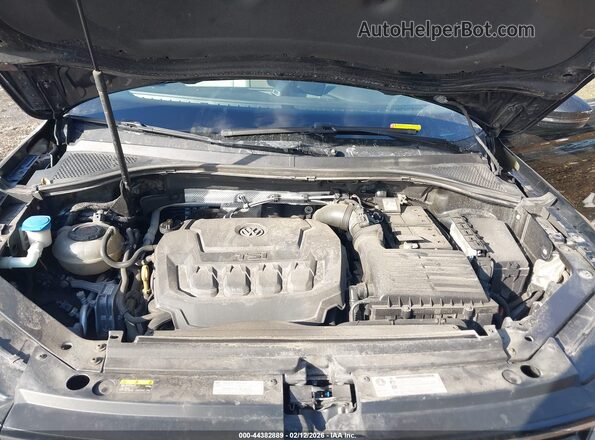 3VV3B7AX9JM079759 2018 VOLKSWAGEN TIGUAN Black Rear view