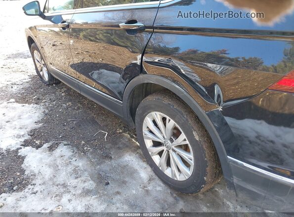 3VV3B7AX9JM079759 2018 VOLKSWAGEN TIGUAN Black Front view