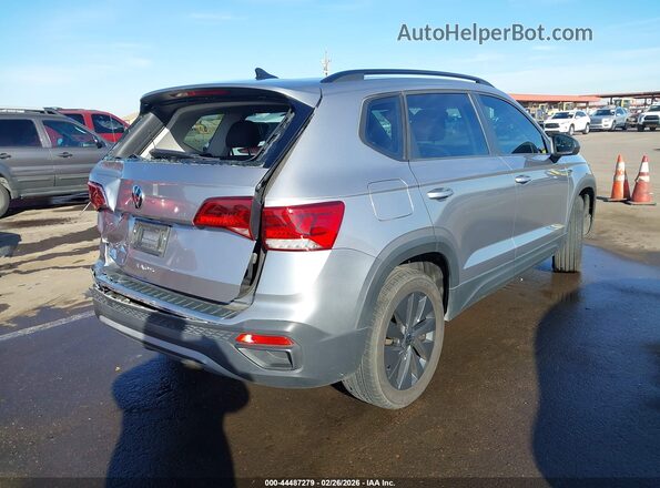 3VVCX7B24PM331284 2023 VOLKSWAGEN TAOS Silver Trasero derecho