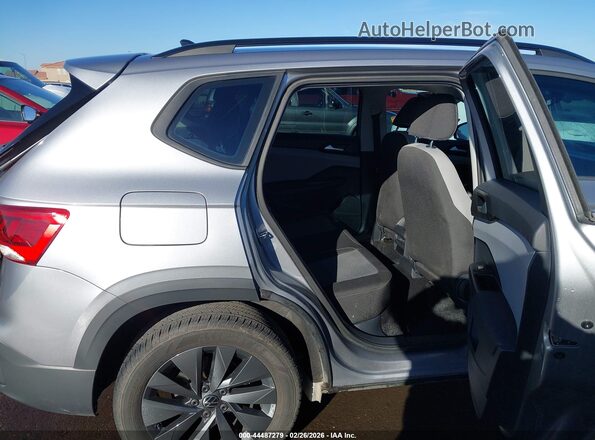 3VVCX7B24PM331284 2023 VOLKSWAGEN TAOS Silver Vista de la etiqueta del VIN