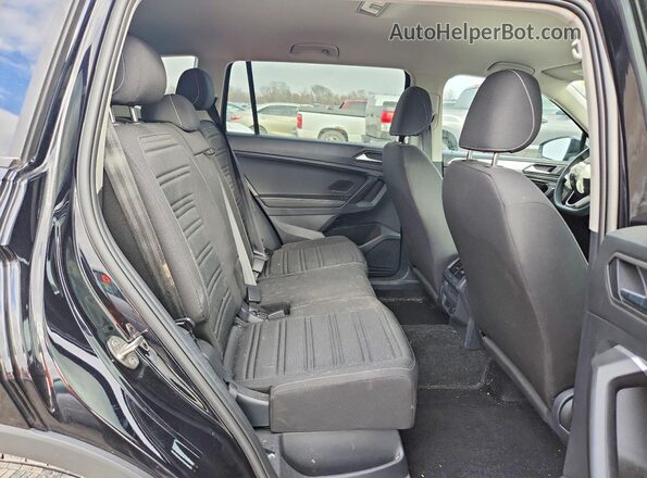 3VVFB7AX7PM114241 2023 VOLKSWAGEN TIGUAN Black Vista interior trasera