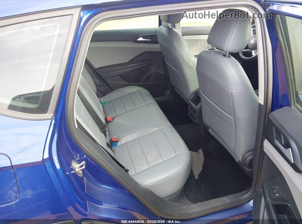 3VVMX7B27NM024080 2022 VOLKSWAGEN TAOS Blue VIN sticker view