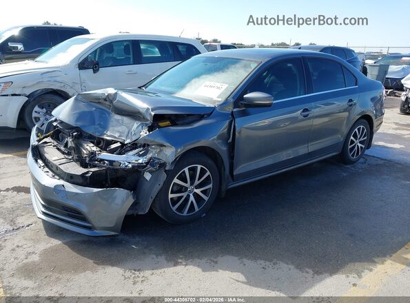 3VWDB7AJ8JM219831 2018 VOLKSWAGEN JETTA Серый Передняя левая четверть