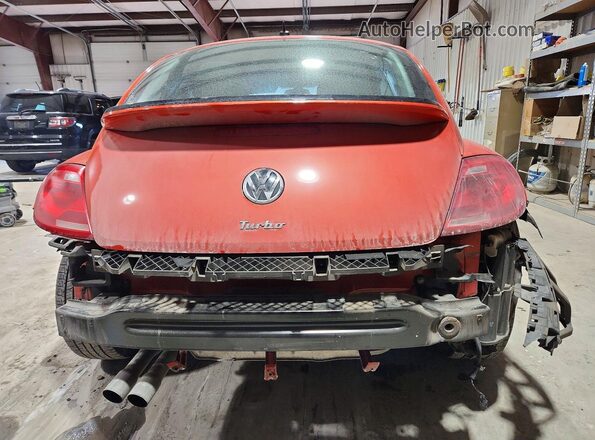 3VWF17AT2GM632012 2016 VOLKSWAGEN BEETLE Orange Вид ззаду
