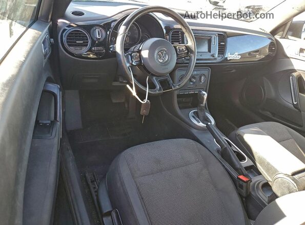 3VWF17AT9HM611515 2017 VOLKSWAGEN BEETLE Black Widok deski rozdzielczej