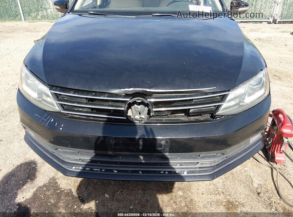 3VWL17AJ3GM385861 2016 VOLKSWAGEN JETTA Black Front view