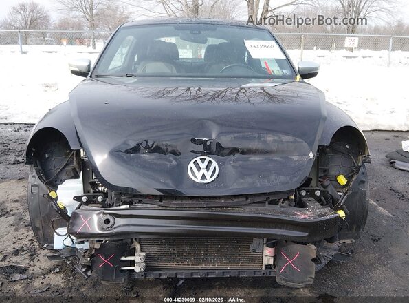 3VWSD7AT0JM711577 2018 VOLKSWAGEN BEETLE Black Front view