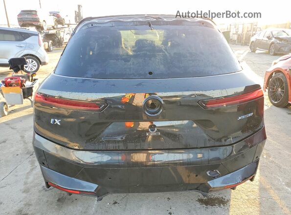 WB523CF07NCJ69751 2022 BMW IX Black Vista interior delantera