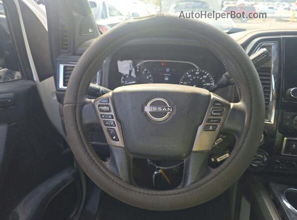 1N6AA1ED7PN102067 2023 NISSAN TITAN White Widok naklejki z numerem VIN