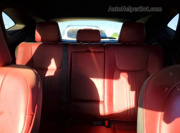 2T2GGCEZXNC004892 2022 LEXUS NX White Widok wnętrza z tyłu