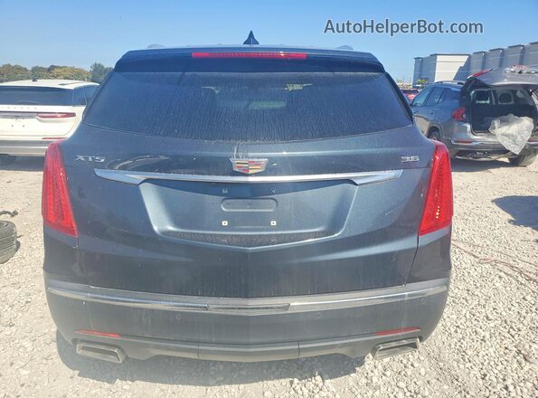 1GYKNCRS7KZ162538 2019 CADILLAC XT5 Синий Вид салона спереди