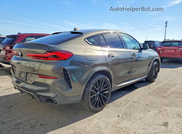 5UXCY6C08L9C89294 2020 BMW X6 Green Front right