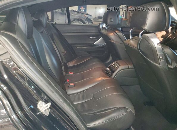 WBS6E9C54GGF92636 2016 BMW M6 Black Вид задньої частини салону