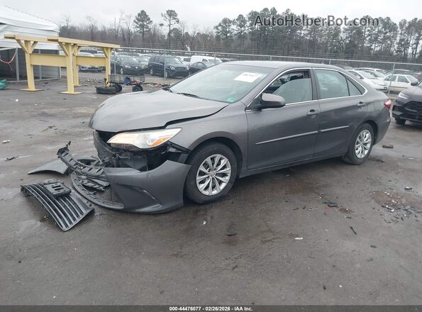 4T1BF1FK3GU567582 2016 TOYOTA LE Серый Передняя левая четверть
