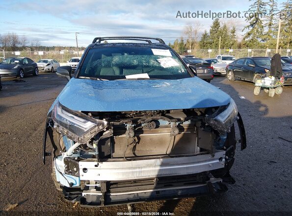 4T3E6RFV4NU085360 2022 TOYOTA RAV4 HYBRID Синий Вид задней части салона