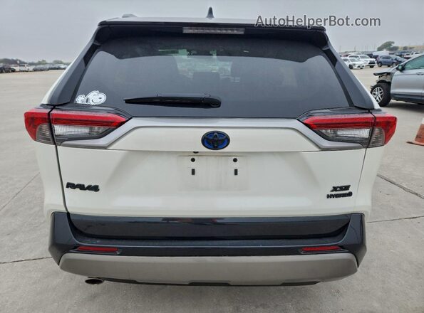 4T3E6RFV4NU099291 2022 TOYOTA RAV4 White Rear view