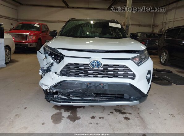 4T3E6RFV9MU041157 2021 TOYOTA RAV4 HYBRID White Սարքավորումների վահանակի տեսք