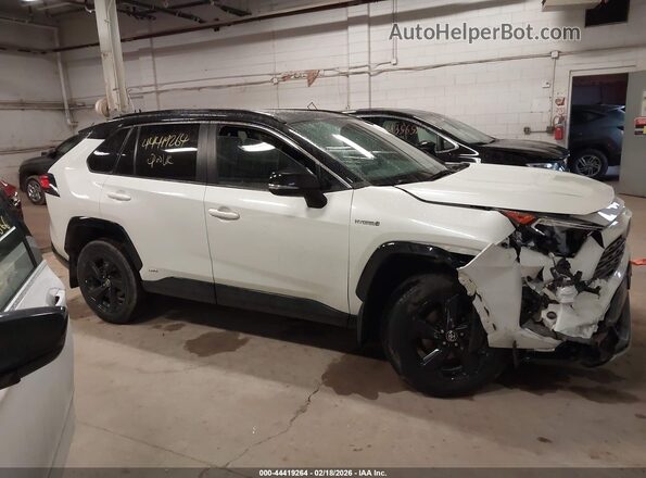 4T3E6RFV9MU041157 2021 TOYOTA RAV4 HYBRID White Սալոնի հետևի տեսք