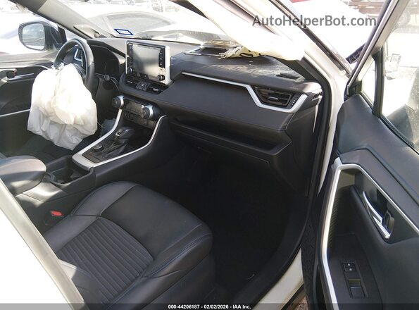4T3E6RFVXMU036548 2021 TOYOTA RAV4 HYBRID White Front interior view