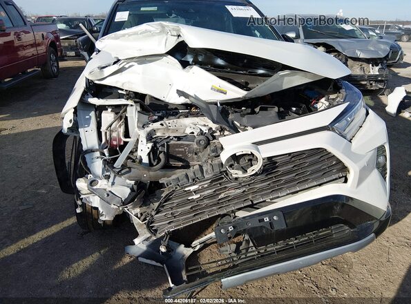 4T3E6RFVXMU036548 2021 TOYOTA RAV4 HYBRID White Front view