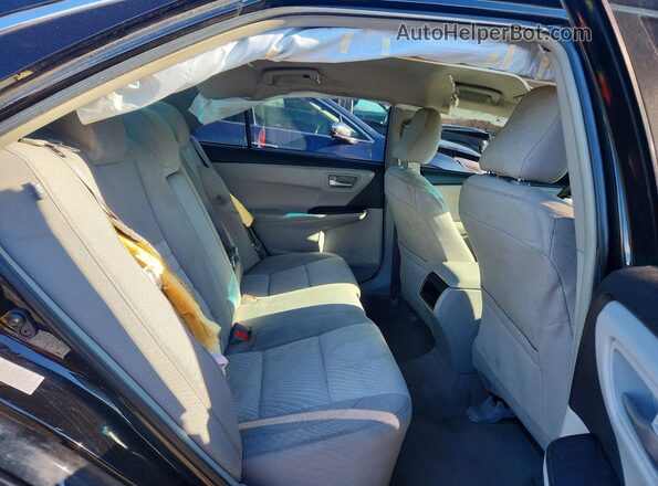 4T4BF1FK7GR579515 2016 TOYOTA LE Black Vista de los asientos traseros
