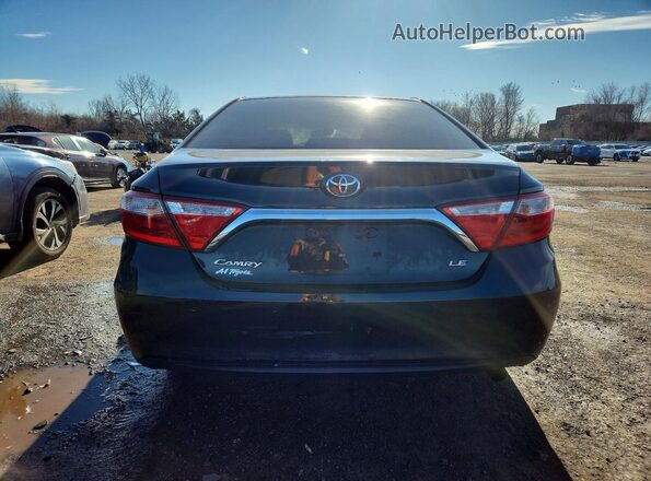 4T4BF1FK7GR579515 2016 TOYOTA LE Black Vista trasera