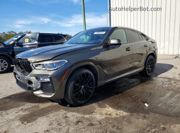 5UXCY6C08L9C89294 2020 BMW X6 Green Rear left